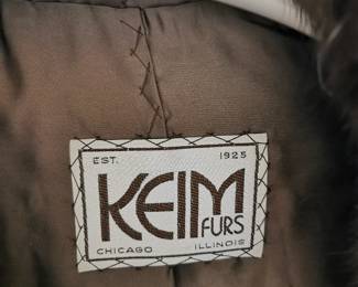 Tag detail of gorgeous vintage oversized rich brown fur jacket featuring wide sleeves by Keim Furs Chicago Illinois