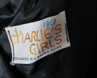Tag detail of vintage 1960s or 1970s Charlie's  Girls Designed by Erika Elias, black leather shorts, full lined