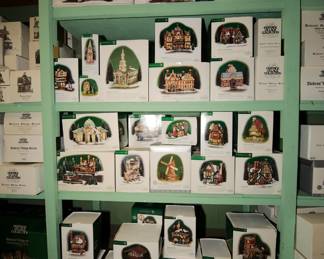 Another floor to ceiling shelf of Department 56 Heritage Village Collection: Dickens Village Series, Christmas Decorations including Hop Castle, Horse & Hounds, Hutchinson Grain Elevator, Ice Crystal Walls, It's almost Thanksgiving, J Hudson Stoneworks, Jacks Pumpkin Carving Studio, Jagerhutte Hunting Cabinet, James Mullet Amish Barn, James Mullet Amish Farms House, Jeremiah Brewskies, Kamm Haus, Kasehandler Schmitt Cheese Shop