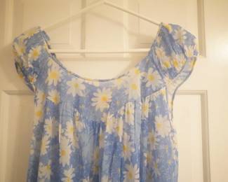 Bodice detail of blue vintage Vera nightgown with white daisies and ruffled collar, matches previous robe