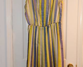 Vintage 1960s or 1970s Jerry Gilden New York pleated boat neck sleeveless cocktail dress with chartreuse, cream, and lavender stripes