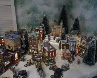Another view of display of the extensive collection of Department 56 Heritage Village Collection Christmas Decorations