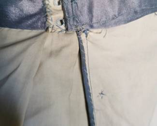 Interior seam finishes and closures of amazing home sewn (!) vintage pleated skirt in a stunning iridescent silver fabric with a matching belt
