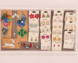Another set of costume jewelry earrings, pins and brooches