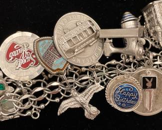 Detail of lovely vintage silver charm bracelet