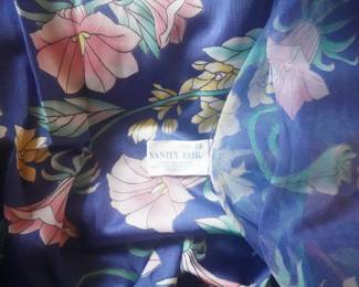 Tag detail of lovely Vanity Fair blue floral nightgown with a sheer cover-up, puff sleeves, and a stand-up collar, Size 38