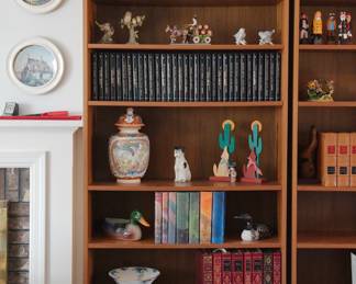 Detail of one of the six (6) matching Made in Denmark teak bookcases 