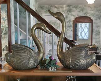 1980s brass decorator's items including a pair of brass swans