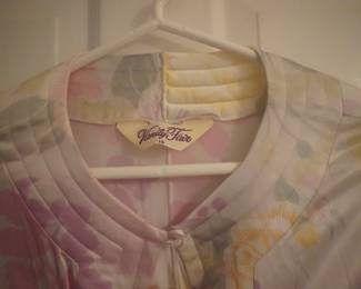 Tag detail of Vanity Fair vintage soft pink floral long sleeve nightgown with a keyhole neckline, Size 16