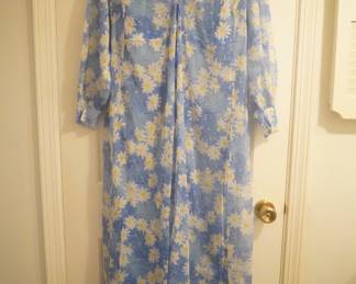Blue vintage Vera robe with white daisies and a button v-neck