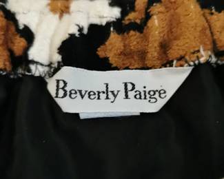 Tag detail of AMAZING unique textured vintage 1970s Beverly Page column skirt with an elastic waist and a matching belt in brown, rust orange, and black latticework pattern, this fabric is amazing