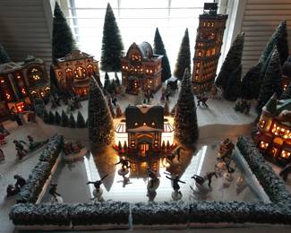 Ice skating rink display of the extensive collection of Department 56 Heritage Village Collection Christmas Decorations