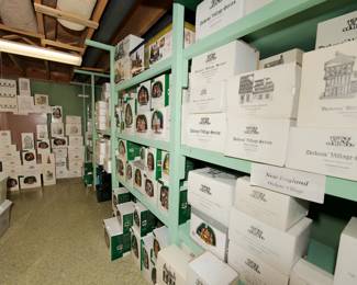 Another view of floor to ceiling collection of Department 56 Heritage Village Collection:  New England Series, Sleepy Hollow, Alpine Village Series, Dickens Series, Christmas Decorations including Pennsylvania Dutch Farm House, Pierce Boat Works, Pigeonhead Lighthouse, Platts candles & wax, Poulterier, Precinct 25 police station, Public House Limited, Radio City, Rathaus Naudirf, Red Brick Fire station, Red Lion Inn, Red Schoolhouse, Revere Silver Works, Ritz Hotel