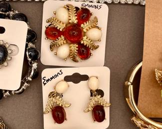 Vintage Emmons pin and matching pair of earrings featuring red cabochons,  gold leaf filigrees,  and milky cream oval cabochons