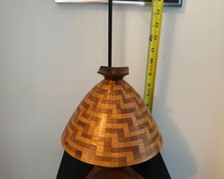 Suspended turnings. Pieces are suspended on Momofilament and are meant to spin or turn. They can be hung from an overhead shelf or wall bracket.