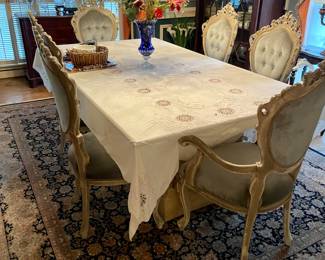 Beautifully carved dining room chairs, beautiful hand made carpet loads of crystal