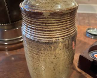 Small, lidded pottery vase 