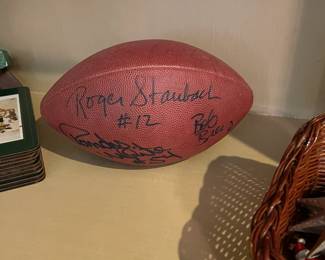 Dallas Cowboys autographed football. Roger Staubach #12, Randy White #54, and Bob 