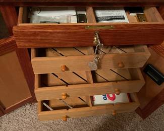 Handmade cigar humidor with locking cabinet and top drawer. 