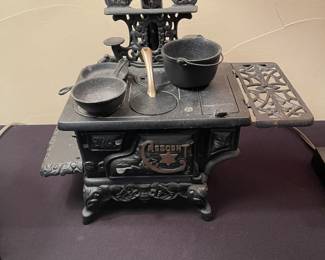 Salesman sample wood stove complete with all pieces. Mint condition!