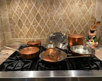 1930's French copper pots and pan set with brass handles.