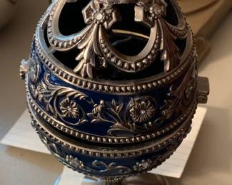 #141	Silverplate Hinged Jewel Enameled w/turning Cherub - 7" Tall	 $25.00 
