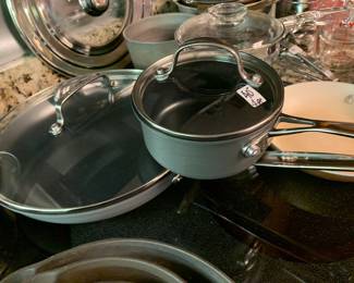 #176	4 pc Cuisanart - Small Sauce Pot and Large Frying Pan (both w/lids)	 $40.00 
