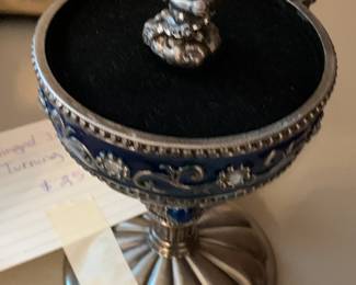 #141	Silverplate Hinged Jewel Enameled w/turning Cherub - 7" Tall	 $25.00 
