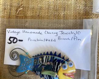 #195	Jewelry 	vintage Handmade Chuang @ jewelry 10 Porcelain metal fish pin	 $50.00 			
