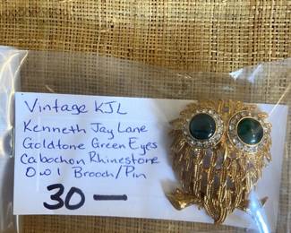 #194		Vintage KJL Kenneith Jay Lane gold tone green eyes Cabochon rhinestone owl Brooch/	 $30.00 			

