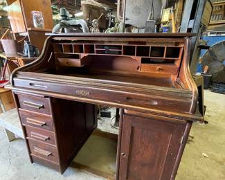 Antique Oak Roll top Desk, needs a little repair on roll