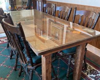 Custom made Table from an oversized Door.   Memorabilia inset under glass