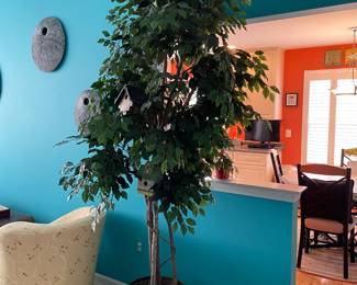 . . . large faux ficus (that means fake) . . . 