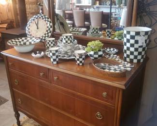 Vintage mirrored dresser featuring McKenzie Childs pieces