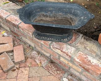 pair of black cast iron pots