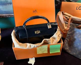 Our prize purse the HERMES Kelly 28 purchased in Paris we have the receipt dust bag and box