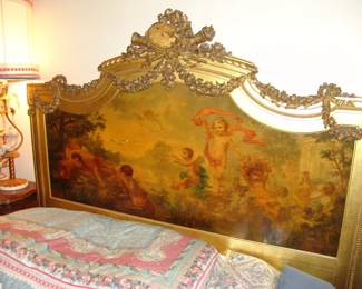 Handpainted and carved headboard of French bed