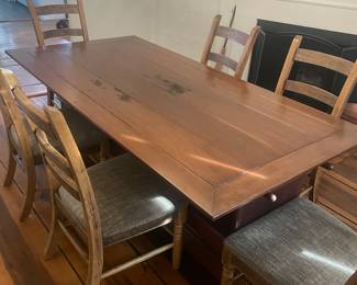 Large Farmhouse style hutch Table with 6 Ladderback Upholstered chairs available.