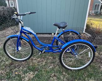 Schwinn Meridian Three Wheel Adult Tricycle Bike with Electric Battery Adapter.  Features low step-through frame, large cruiser seat and sturdy rear baskets to help make errands a snap!