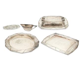 41
Louis W. Rice (1872-1933)
A group of Shadowardt silver-plated table items, mid-20th century
Each marked: Apollo E.P.N.S / Made By Bernard Rice's Sons Inc. / Shadowardt
Comprising a gravy boat (2.75" H x 8.25" W x 3.5" D) with underplate (0.5" H x 8" W x 5" D), a covered entrée dish (3" H x 11.75" W x 10.25" D), a rounded serving dish (1" H x 14.125" W x 13.625" D), and a rectangular serving dish (0.625" H x 15" W x 11.325" D)
5 pieces
Estimate: $700 - $900