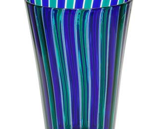 157
After Gio Ponti (1891-1979)
A vase "A Canne" for Venini, 1991; Venice, Italy
Acid etched to underside: Venini / 91; with sticker to side: Venini Murano / Made in Italy
The Murano glass vase with alternating cobalt blue and emerald green stripes
9" H x 6.5" Dia.
Estimate: $600 - $900