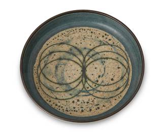 133
Harrison McIntosh (1914-2016)
A glazed stoneware low bowl, mid-20th Century
Marked to the underside with potter's stamp: HM; further marked with paper label to the underside: Handthrown Stoneware / Harrison McIntosh / Claremont / California
With an all-over cerulean glaze and concentric circles motif to interior
1.75" H x 8.625" Dia.
Estimate: $700 - $900