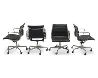 214
Charles And Ray Eames (1907-1978 And 1912-1988)
Four Aluminum Group armchairs for Herman Miller, 21st century
Designed 1958
Each with Herman Miller tag to underside
Each with cast aluminum frame and arms and black leather sling-style upholstered seats, set on a five-legged base with casters
4 pieces
Height variable: 34" H x 23" W x 21.5" D
Estimate: $1,000 - $2,000