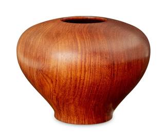 18
Rene Megroz (B. 1942)
A turned wood vessel, 1991
Signed and dated to underside: Rene Megroz / 1991
4.325" H x 5.75" Dia.
Estimate: $400 - $600