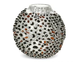 155
2018
A Siemon & Salazar Studio Glass Urchin Vase
Acid etched signature and date: Siemon & Salazar / 2018
Crafted by Caleb Siemon (b. 1975) and Carmen Salazar (b. 20th century) in their studio with murrini cane spines fused to clear glass
8.5" H x 8.5" Dia.
Estimate: $400 - $600