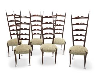103
Mid-20th century
A Set Of Italian Modern Dining Chairs
Each with spurious vinyl tag to leg interior: Ico Parisi
In the manner of Ezio Minotti (active 1950s/60s), Paolo Buffa (1903-1970), and Gio Ponti (1891-1979), the carved wood chairs with sculptural ladder back mounted with pointed finials, upholstered in a patterned mohair velvet fabric with foliate motif and brass rivets, raised on tapered curvilinear legs, 6 pieces
Each: 53" H x 17.75" W x 18.5" D
Estimate: $2,000 - $4,000
