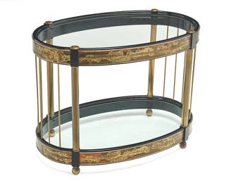 144
Bernhard Rohne (B. 1947)
An oval side table for Mastercraft, circa 1970s
Appears unmarked
The black lacquered wood table banded with acid-etched brass art by Bernhard Rohne, with glass top and undershelf and brass tubular supports, set on four brass ball feet
24.5" H x 32.25" W x 19.5" D
Estimate: $500 - $700