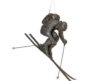 220
1992
A Bronze Figure Of A Skier
Edition: 5/50
Signed illegibly, numbered, and dated in the casting: 1992; titled to giltwood plaque: Dropping In
The hanging patinated bronze figure depicted in motion down a mountain, with removeable poles
Figure: 12" H x 25" W x 6.5" D
Estimate: $400 - $600