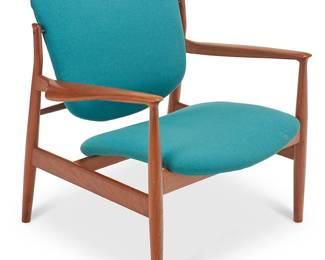 135
Finn Juhl (1912-1989)
Model 136 armchair for France & Sons, mid-20th century; Denmark
With metal tag to underside: FF C France; no serial number present
The chair with teak wood frame and sculpted curvilinear arm rests, each cushion with teal upholstery, the back swivel-mounted to arms and locked to rear stretcher
30.75" H x 31.25" W x 30" D
Estimate: $1,200 - $1,800