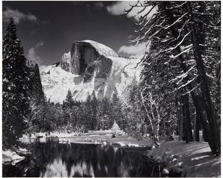 251
Ansel Adams
1902-1984
"Half Dome, Merced River, Winter," 1938
Gelatin silver print on paper mounted to a board mount
Edition: 1175 of S.E.Y. [Special Edition Yosemite], printed later
Signed faintly in ink on the mount, at right: Ansel Adams; titled, numbered, and inscribed No. 5, all in ink in the corresponding blanks of the special edition Photographs of Yosemite black ink stamp on the verso of the mat board mount
Image/Sheet: 7.75" H x 9.625" W; Mount: 12" H x 15.375" W
Estimate: $2,500 - $3,500